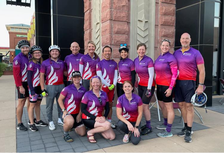 Group of bike riders wearing Epilepsy Foundation branded jerseys