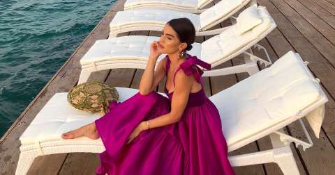 Camila Coelho Sitting by the Ocean