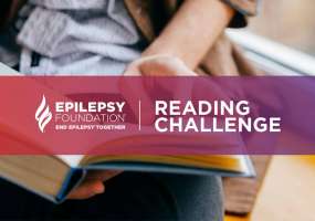 person reading book for reading challenge